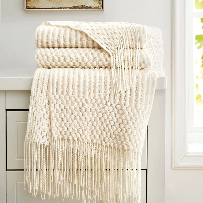 Soft and warm woven blanket with tassels