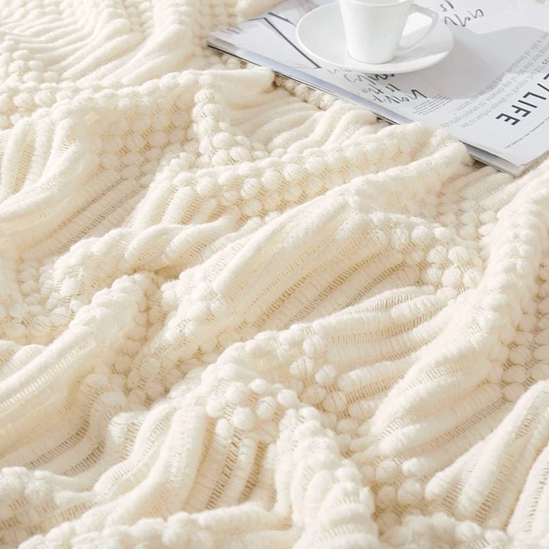 Soft and warm woven blanket with tassels