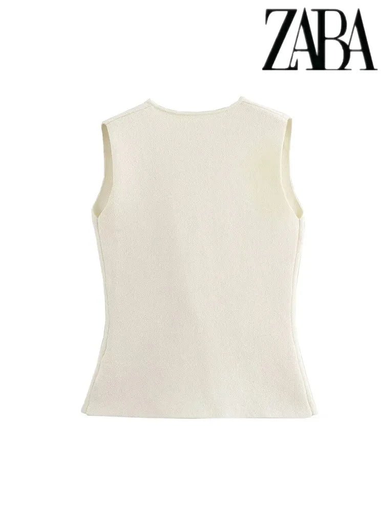 Women's two-piece set with a modern design, including a jacket and shorts in knitted fabric.