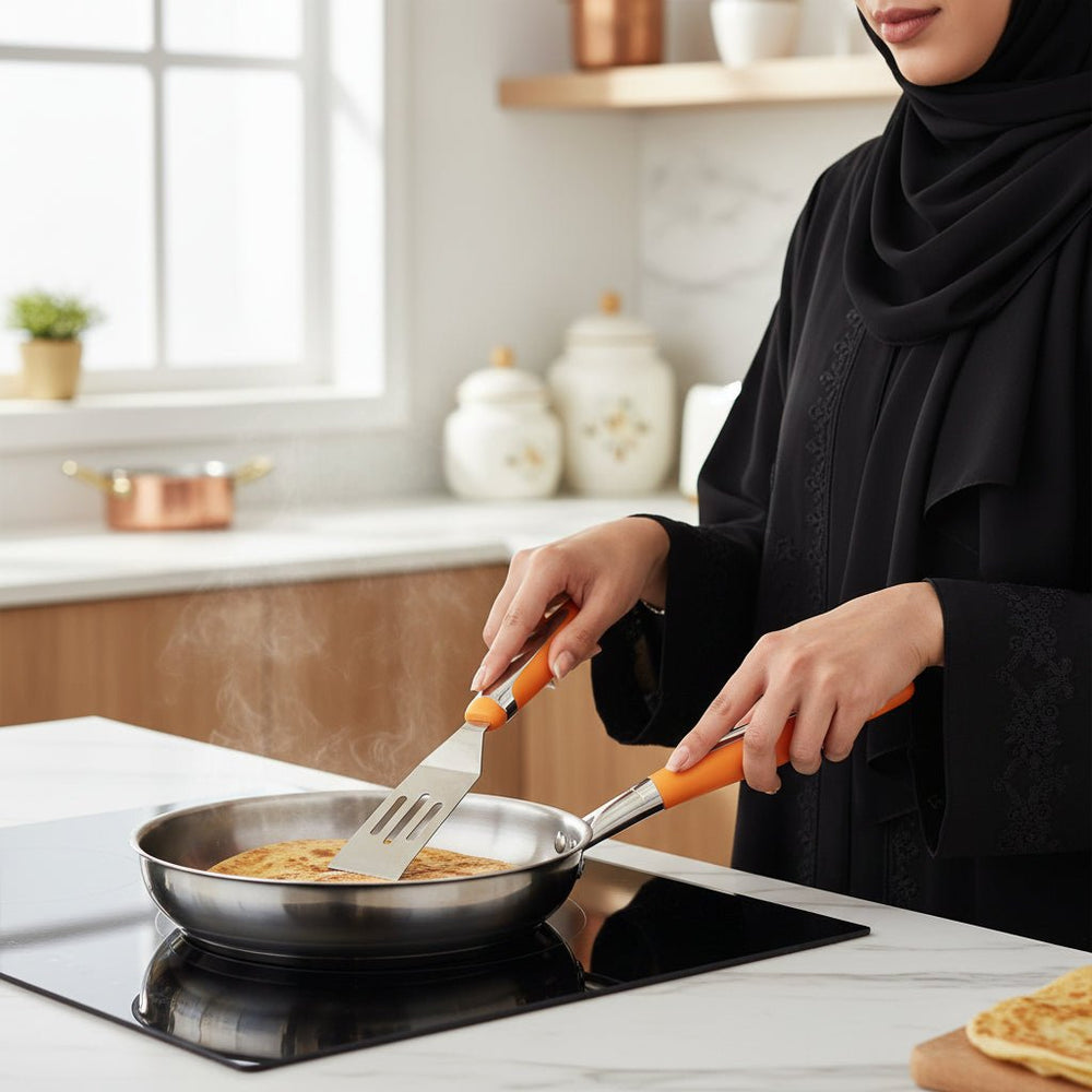 ملعقة تقليب سباتولا صغيرة بمقبض برتقالي 25 سم